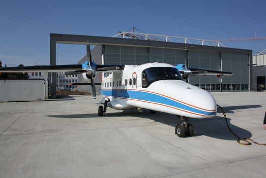 The Dornier 228 aircraft used in the experiments. The glass dome that houses the telescope can be seen on the base of the fuselage.